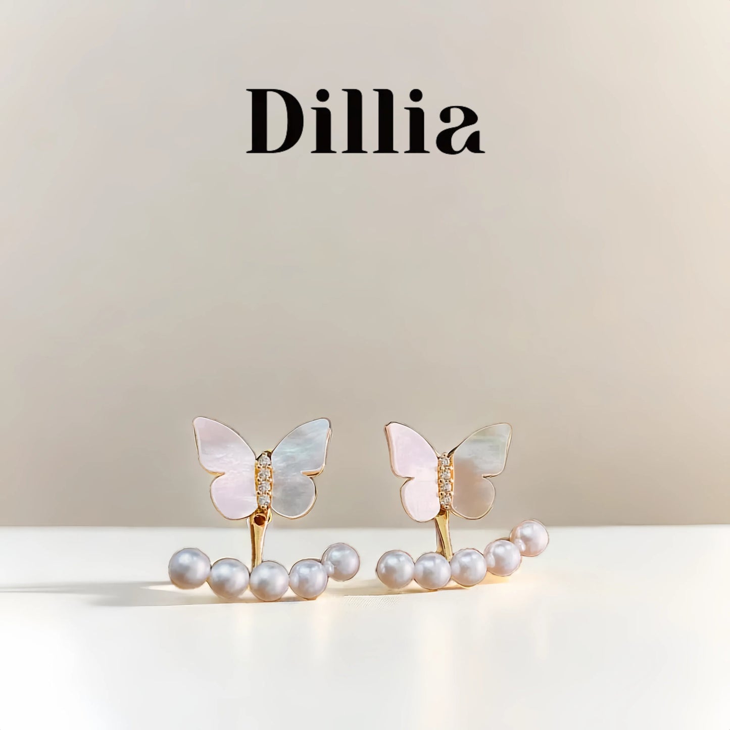 Elegant Pearl Butterfly Stud Earrings
